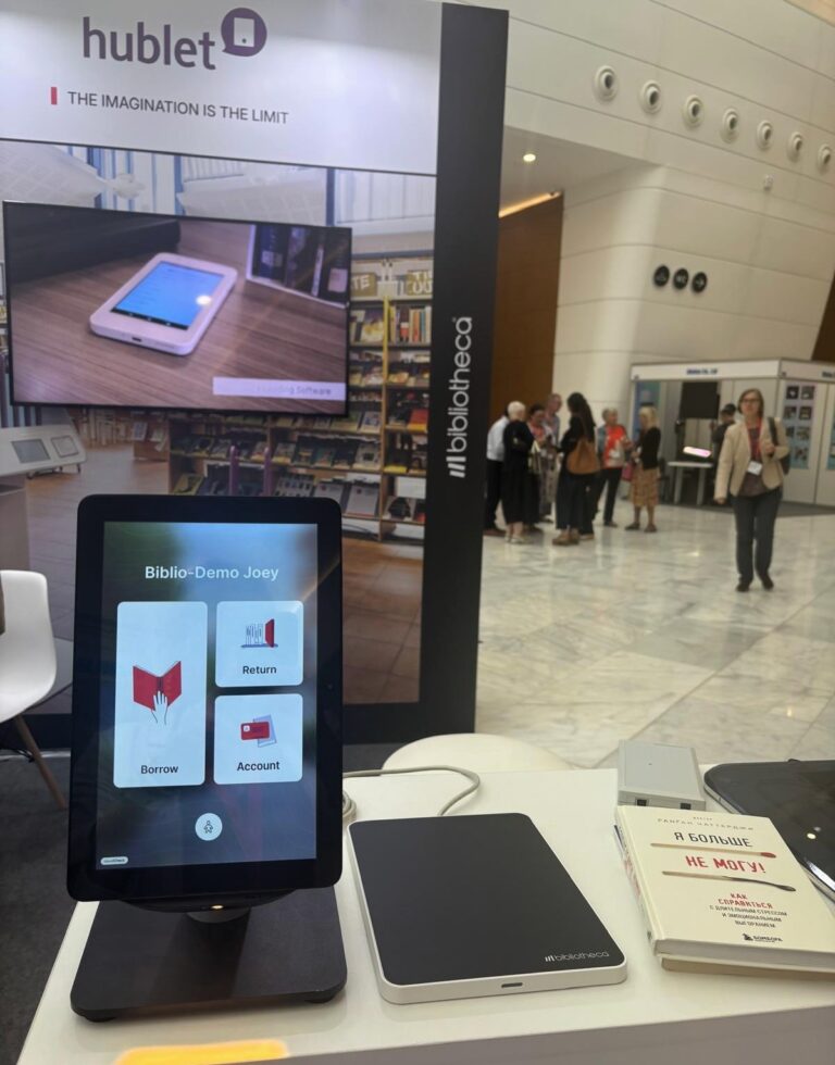 A tablet with the Bibliotheca cloudCheck app, showcasing a modern interface for borrowing and returning library materials.