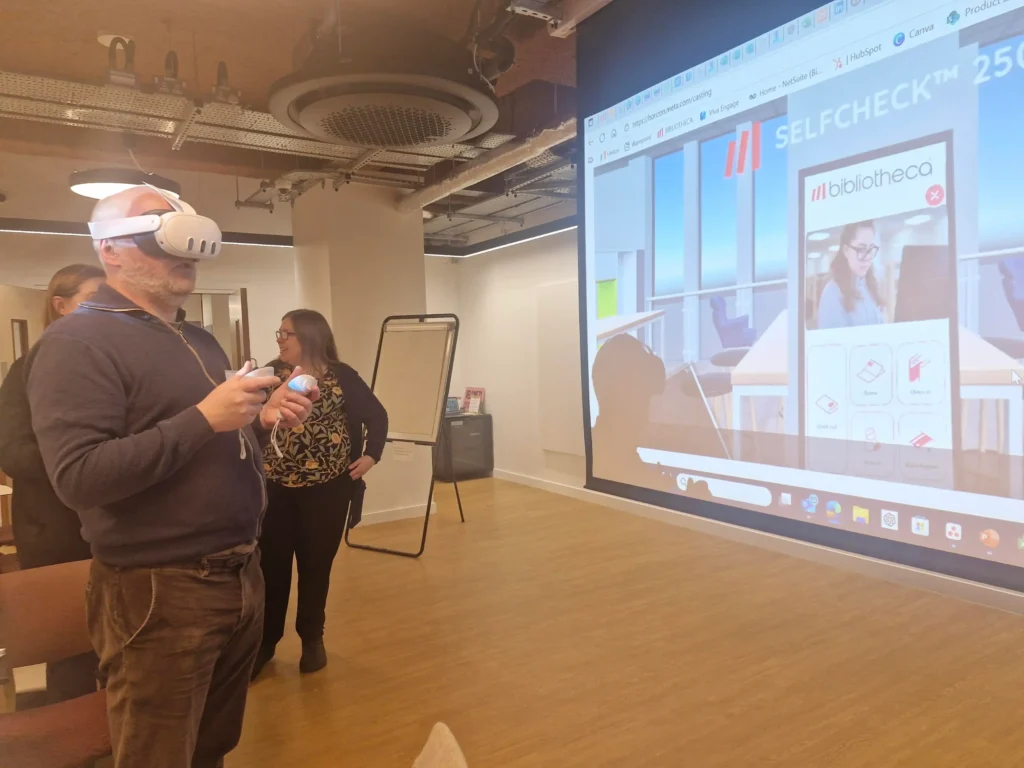 Library professionals experiencing the Bibliotheca VR Tour during the North Roadshow at The Stockroom.